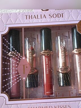 Thalia Sodi Charmed Kisses 2-piece lipstick and 3-piece lip gloss collection.
